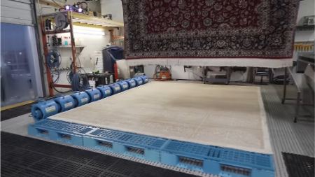 شستشوی فرش با به روزترین دستگاه قالیشویی و ماشین آلات اتوماتیک در کارخانه قالیشویی پاک مهر