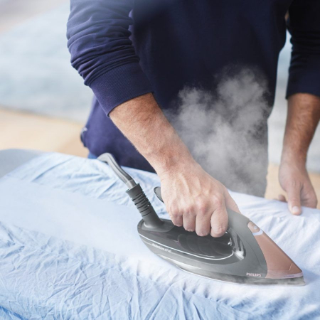 علت داغی بیش از حد اتو, چرا اتو به لباس می چسبد